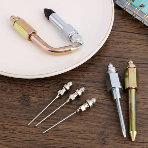 Seven Piece Grease Gun Accessory Kit With Three Nozzles One Needle Dispenser Rubber Joint Fitting Bent And Straight Nipples displayed on table