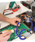 Heavy-Duty Soldering Helping Hand Tool With Flexible Arms And Welding Station Holder for expert PCB repair in use