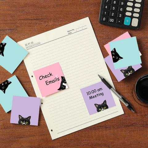 Nine Pad Cat Themed Sticky Notes Set In Pink With Super Adhesive Self Stick Notes, 3x3 Inch on desk with notepad and pen