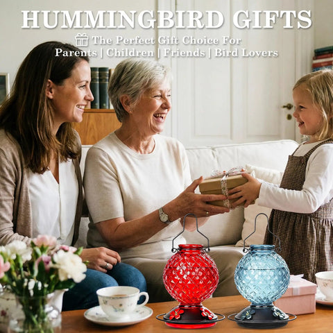 Family exchanging gifts with hummingbird feeders in front, red and blue 25 Oz Glass Hummingbird Feeder With Ant Moat And Bee Proof Feeding Ports.