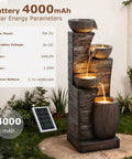 38.2 Inch Solar Powered Outdoor Water Fountain with Four Tier Cascading Bowls and Stacked Stones LED Lights on patio