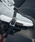Shoe in toe clip cage adapter for Look Delta pedals, attached to bike, showing sneaker-friendly design for indoor cycling