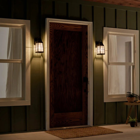 Tolerand 12 Inch Outdoor Wall Light in Textured Black with Clear Seeded Glass on porch, nighttime glow, weather resistant