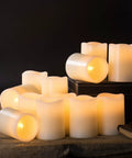 12 Pack Flameless Candles With Real Wax Battery Operated LED Pillar Candles Unscented Ivory Color Including Remote Control.