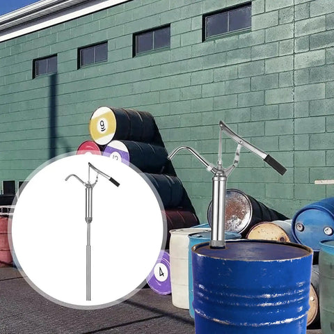 Heavy Duty Manual Oil Drum Pump With Ergonomic Handle for High Pressure Transfer mounted on a blue oil drum in an outdoor setting.