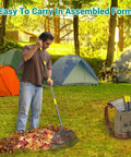 Person using Adjustable Garden Rake With 36 To 73 Inch Extendable Handle 18 Inch Wide Head 25 Metal Tines for yard cleanup
