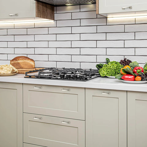 Modern kitchen with cabinets featuring 30 Pack Solid 3 Inch Square Foot Arch Cabinet Pulls In Brushed Nickel Finish, vegetables on countertop.