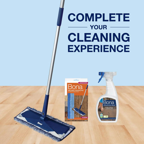 Microfiber Dust Pad For All Floor Surfaces That Attracts Dust Hair And Dirt With Electrostatic Action shown with cleaning products