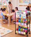 Classroom with Hydration Station Top Notch Classroom Rolling Cart With 3 Tier Plastic Bottle Organizer, black finish, kids around.