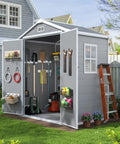 Open 6x4 Ft Resin Outdoor Storage Shed With Floor And Window, Lockable Door, showing tools and garden supplies inside, in backyard