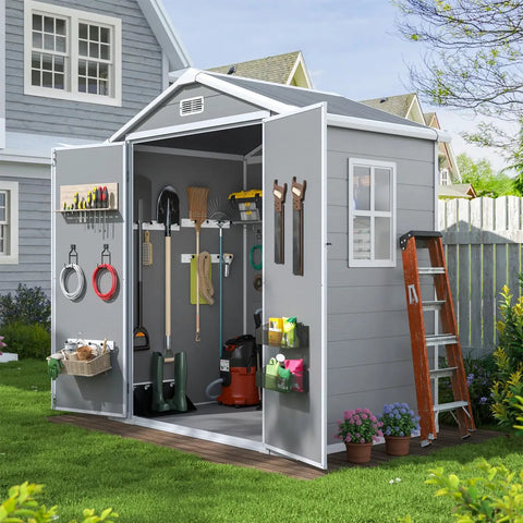Open 6x4 Ft Resin Outdoor Storage Shed With Floor And Window, Lockable Door, showing tools and garden supplies inside, in backyard