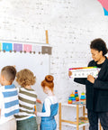 Teacher using Number Line Dry Erase Boards Set With Double Sided Writable 0 To 10 On One Side And 0 To 20 with students in classroom