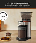 Game Changer Flat Burr Coffee Grinder delivering eighteen precision grind options, stainless steel with coffee grounds visible.