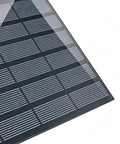 Close-up of solar panel for Sun Powered Pond Pump Kit With 1.5W Silent Motor, 200L High Flow Rate reflecting light