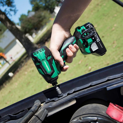 Using the Powerhouse 18V Cordless Brushless Impact Driver with 1522 in-lbs torque on outdoor automobile repair.