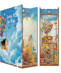 DIY Book Nook Kit For Adults With 3D Wooden Puzzle Bookend And Shelf Insert, Totally Cozy Library Decor For Shelves, Miniature House Kit With Body Motion Sensor LED Light, Travel With The Wind Edition showing colorful balloons and houses