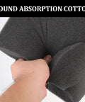 Hand holding a gray sound absorption cotton block, showcasing its flexible texture for easy installation with 4 Piece Low Frequency Acoustic Absorption Blocks Polyurethane Wall Sound Dampener Noise Control Blocks For Recording Studio Home Theater Easy Cut Installation Banish That Muddy Bass Once And For All.