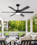 52 Inch Black Low Profile Ceiling Fan With Light And Remote, Dimmable LED, Flush Mount on patio with seating area.