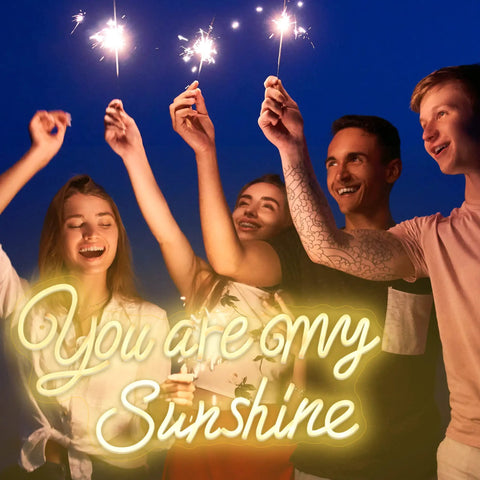 Group holding sparklers above 'You Are My Sunshine' neon sign, Personalized You Are My Sunshine Neon Sign Large 23 Inches Dimmable LED Neon Light