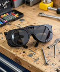 Flip Up Heavy Duty Welding Goggles Featuring Dual Lens Glare Blocking For Plasma Cutting And Electric Welding Ergonomic Safety Shades on workbench.