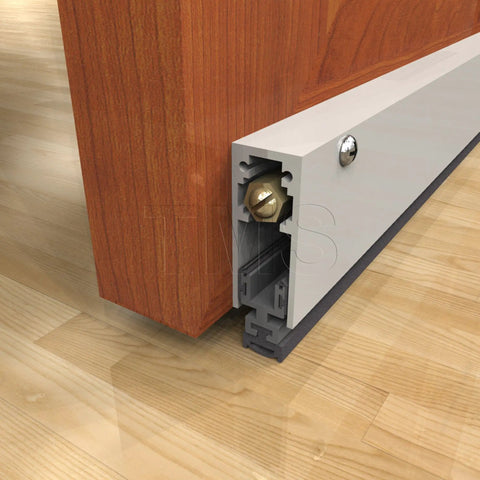 Automatic Door Bottom Seal With Double Neoprene Seal attached to wood door edge, showing aluminum housing and neoprene seal.