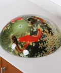 Overhead view of Koi And Lily Pond Glass Vessel Sink With Tempered Glass, 16.5 Inch Diameter By 5.75 Inch High, European Design Elevates Your Modern Bathroom Upgrade.