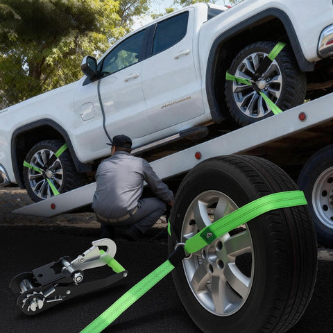 Man securing truck with Beefy Four Pack Car Tie Down Straps For Trailers With O Rings And Ratchets 2 Inch By 8 Foot Wheel Straps 10000 Lb Break Strength 3333 Lb Working Load Adjustable Lasso Style Haul Cars Trucks UTVs Green
