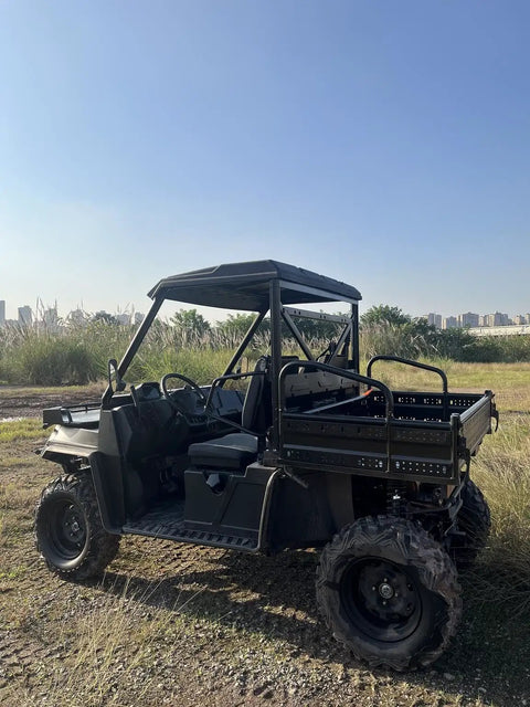 Side view of Rugged 1000Cc Off Road UTV For Construction And Farm Work Heavy Duty Utility Vehicle in a grassy field