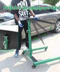 Pro Grade Adjustable Height Rolling Work Table On Wheels With Heavy Duty Steel, Foldable Design, side view in garage setting.