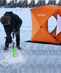 Person using 7 Inch Nylon Ice Drill Auger With 41 Inch Length And 19.6 Inch Extension Rod on ice near orange tent