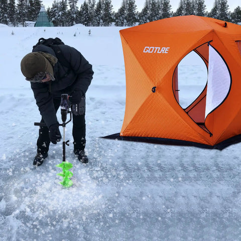 Person using 7 Inch Nylon Ice Drill Auger With 41 Inch Length And 19.6 Inch Extension Rod on ice near orange tent