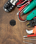 TOKIDNY Pneumatic Wire Crimping Machine With Advanced Pressure Control And Durable Metal Dies For Electrical Communication Work Universal Attachments Maximize Efficiency Heavy Duty Industrial Tool, assorted crimping tools on a wooden surface.