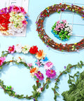 DIY Flower Crown Making Kit with 168 pieces including floral wreath supplies, green rattan strips, vibrant flowers, and ribbons.