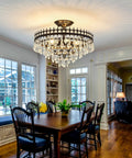 5-Light Modern Crystal Chandeliers Dope Matte Black Semi-Flush Mount Ceiling Light Fixture illuminating a farmhouse dining room
