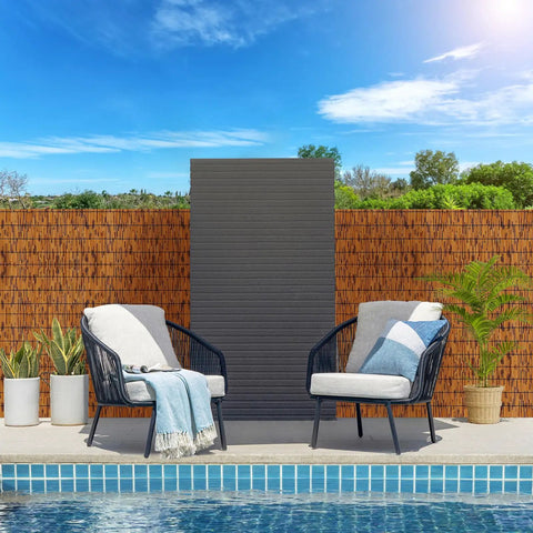 Natural Reed Fencing Roll 4 By 16 Ft Handwoven Bamboo Privacy Screen For Balcony Patio Garden Backyard Outdoor Use Light Russet Finish Decorative Reed Curtain For Privacy Shade And Easy Outdoor Vibe behind outdoor chairs by pool.
