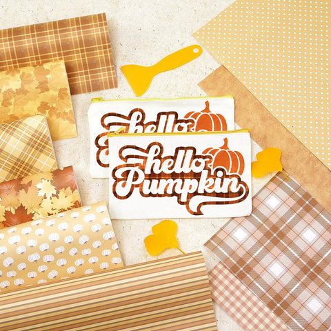 Fall Sublimation Transfer Paper Bundle, 10 Sheets, 12 By 10 Inches, with "hello pumpkin" design for mugs and shirts, top view.