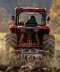 54 Inch Disc Plow Harrow For ATV UTV With 2 Inch Receiver Pull Behind Tiller in use on muddy field with tractor
