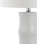 Close-up of 26.5 Inch White Ceramic Table Lamp With Linen Drum Shade And Bamboo Design For Living Room Or Bedroom Nightstand Modern Bedside Light