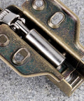 Close-up of Soft Close Cabinet Hinges 2 Pack with Hydraulic Dampers showing stainless steel and copper core detail.
