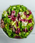 Bowl of fresh salad greens grown from Organic Lettuce Seed Packet Gourmet Blend Heirloom Non GMO Pollinator Friendly For Container Gardening