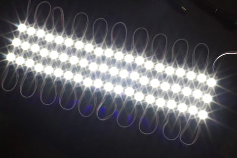 Crazy Bright 24V White LED Module Light Kit with Z3030 Injection illuminated on dark background, showcasing 120 LEDs in array