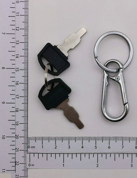 Ignition Key For Honda And Clone Generators And GX Engines Replacement Part 35111-880-013 with ruler for scale