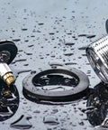 Heavy Duty Tub Drain Kit With Slick Push Pull Bathtub Strainer And Durable Zinc Alloy Body Plus Classic Chrome Finish components on wet surface.