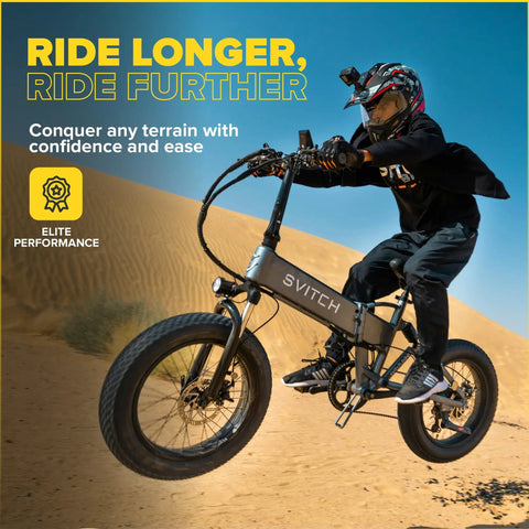 Person riding e-bike with Fat Tire Liner For Bikes Tube Protection Against Flats With Durable Extruded Plastic Shield Fits 20 24 And 26 Inch 4 Inch Fat Tires Puncture Protection For Mountain Street Or Cruiser Bikes Perfect For E Bikes 2 Pack on sandy terrain