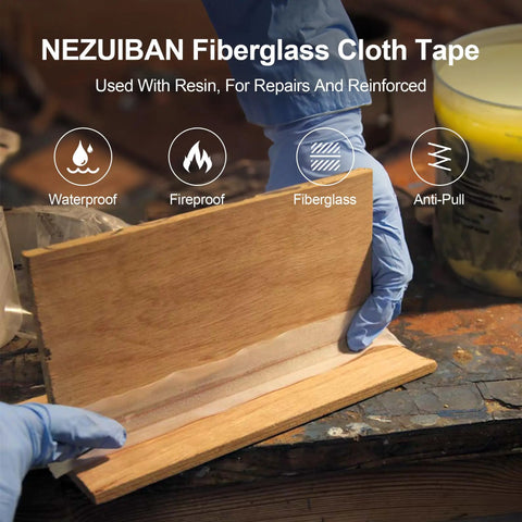 Workhorse Fiberglass Cloth Tape 2 Inch Wide By 50 Yards, 6 Oz, applied to wooden surface for repairs in workshop setting.