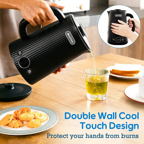 1.7L Large Electric Kettle With Temperature Control, 7 Cup Capacity, Black, being used to pour hot water into a glass.