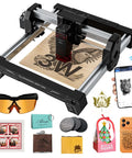 Atomstack Swift Mini laser engraver on aluminum frame engraving wood panel, smartphone control shown