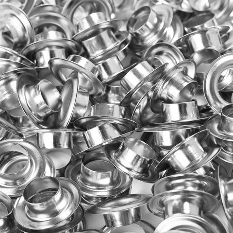 Close-up of silver metal grommets, 3/8 in (10 mm), 1000-piece bulk kit