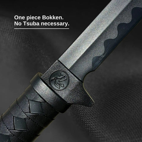 Close-up of Polypropylene Ninja Training Sword II with black blade and textured grip, 34.25 inch length, one-piece design.