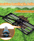Heavy Duty Lawn Leveling Rake With Four Spiked Wheels And Smooth Roller For Multi Surface Grading shown leveling soil